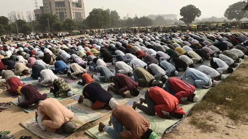 muslims praying at street